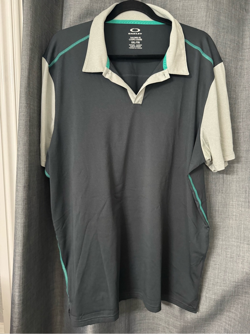 Oakley Black Polo with Gray Sleeves and Teal Piping